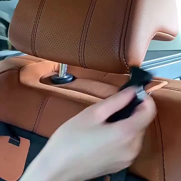 Attaching the strap to the headrest